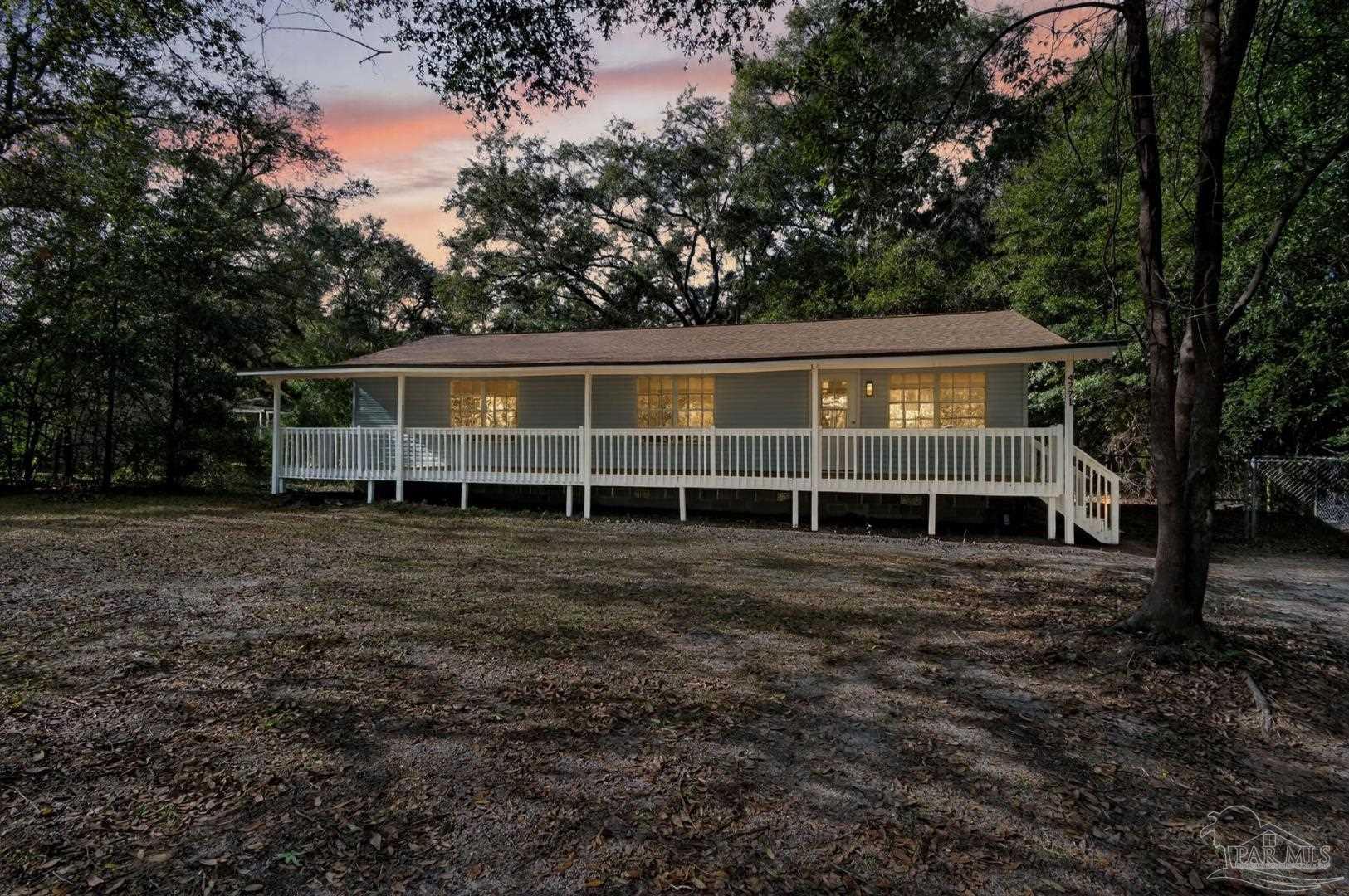 4771 Carl Booker Road Milton, FL 32583 - Photo 4 of 65 a view of backyard with green space