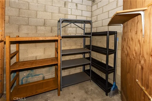 a view of a room with wooden walls