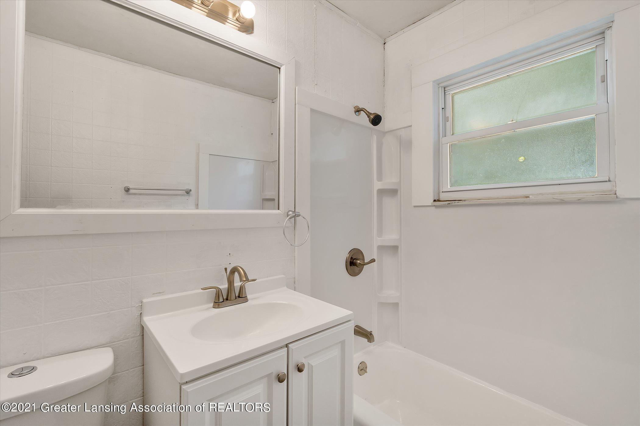 6532 Sommerset Road Lansing, MI 48911 - Photo 21 of 37 21-6532-Sommerset-Rd-WindowStill-Real-Es