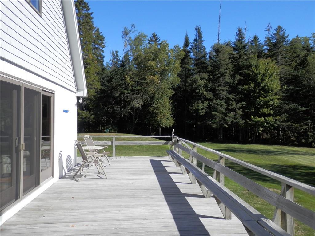 226 Atlantic Quarry Road Spruce Head, ME 04859 - Photo 5 of 35 Spacious deck with privacy buffer of...