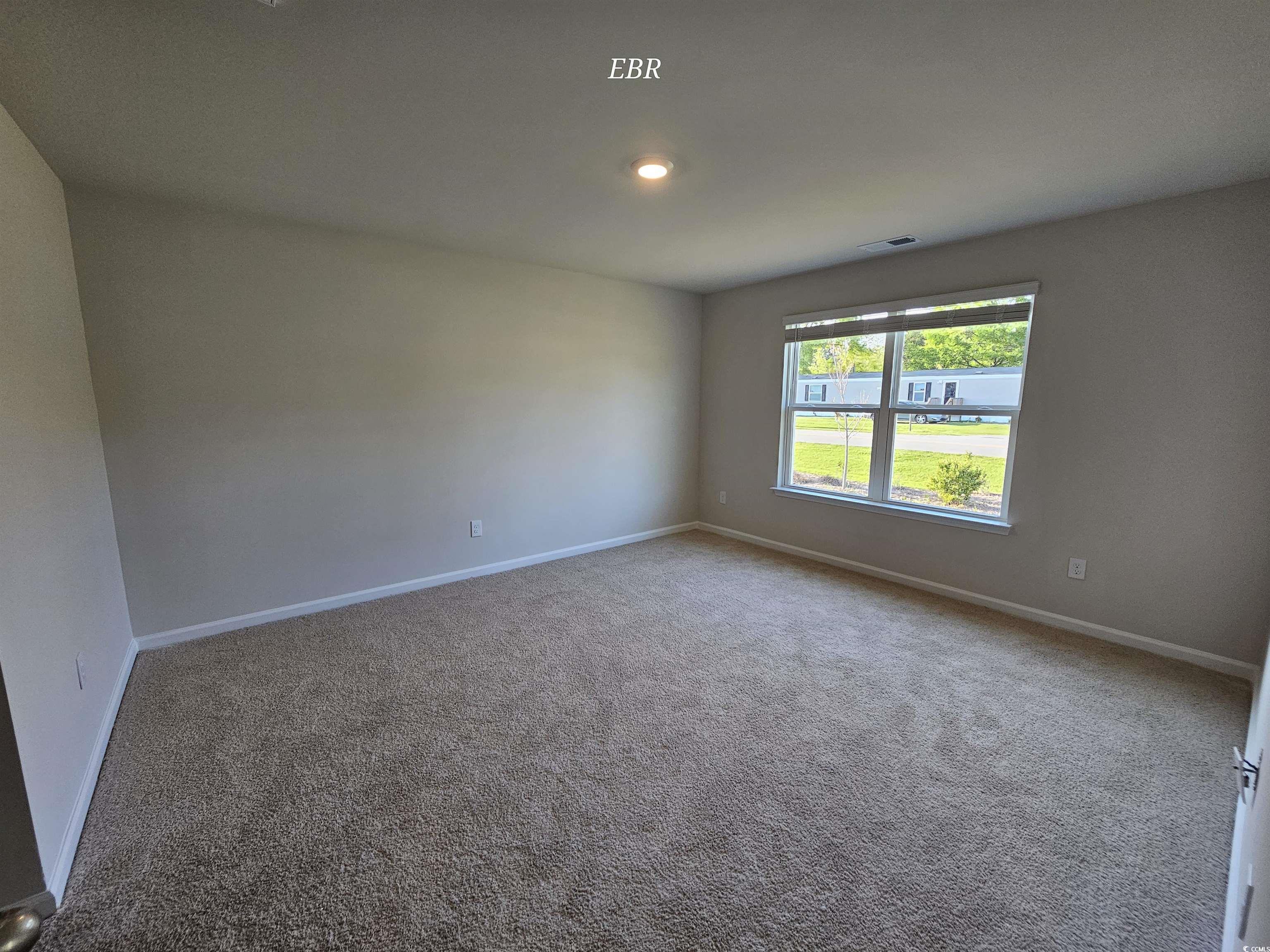 370 Jeff Waters Circle Longs, SC 29568 - Photo 11 of 14 Empty room featuring visible vents, baseboards, an
