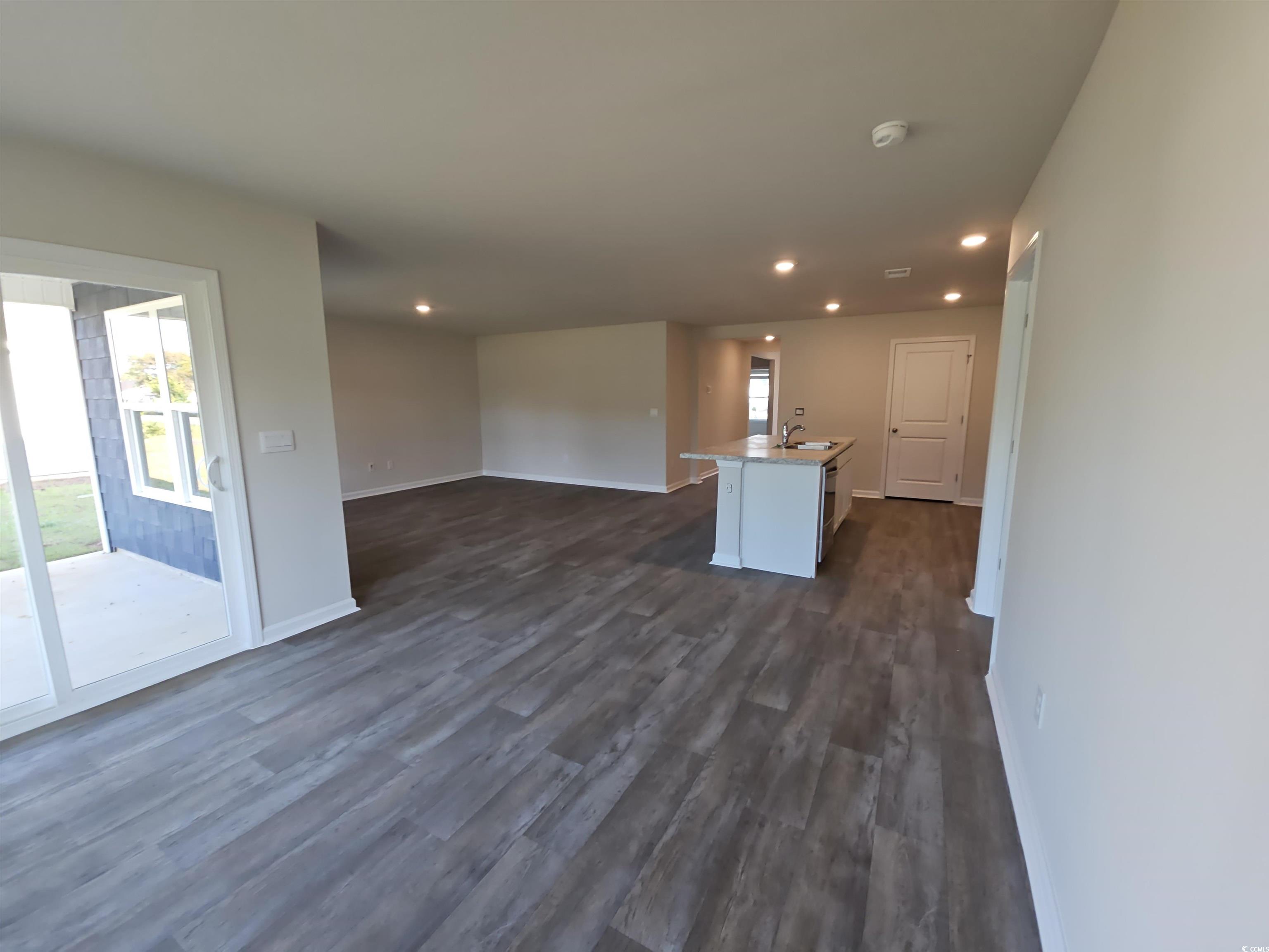 370 Jeff Waters Circle Longs, SC 29568 - Photo 6 of 14 Interior space featuring dark wood finished floors