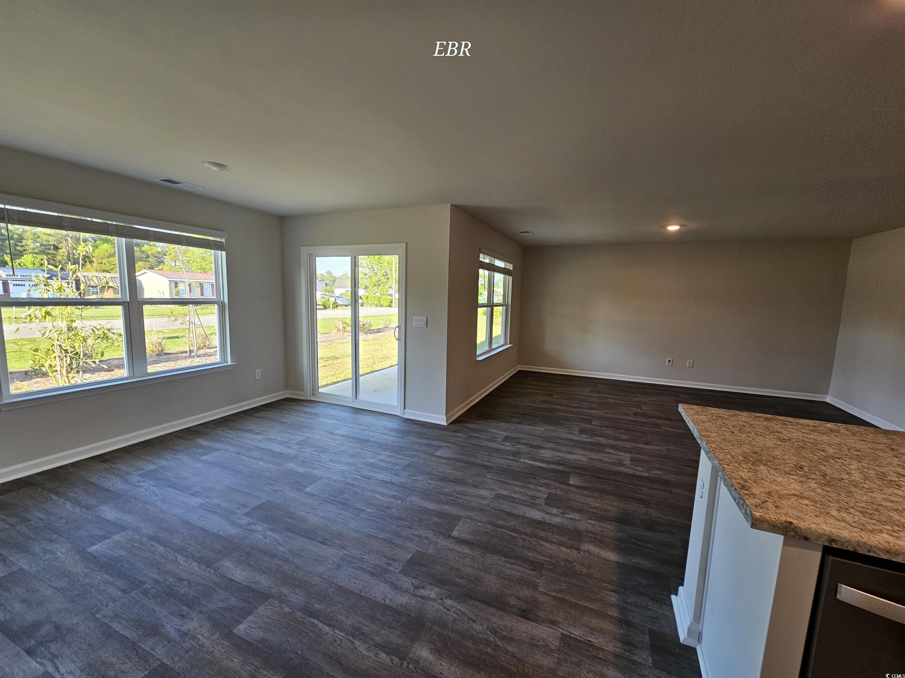 370 Jeff Waters Circle Longs, SC 29568 - Photo 7 of 14 Unfurnished living room with baseboards, recessed