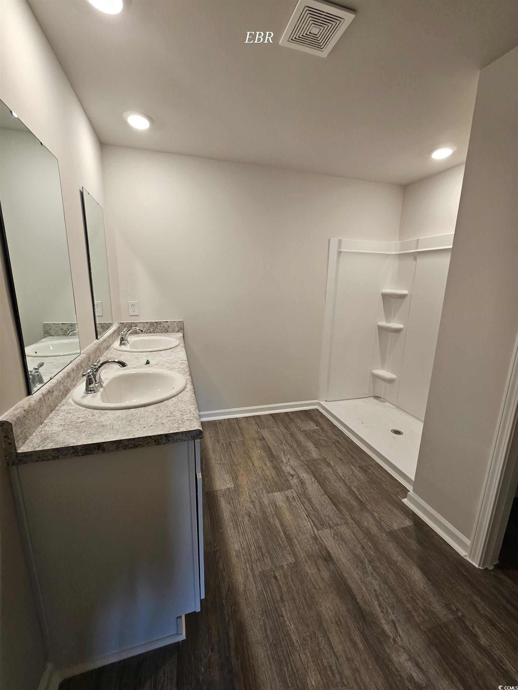 370 Jeff Waters Circle Longs, SC 29568 - Photo 9 of 14 Full bath with wood finished floors, visible vents