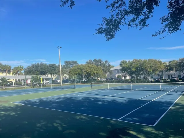 a view of a garden with a lake view