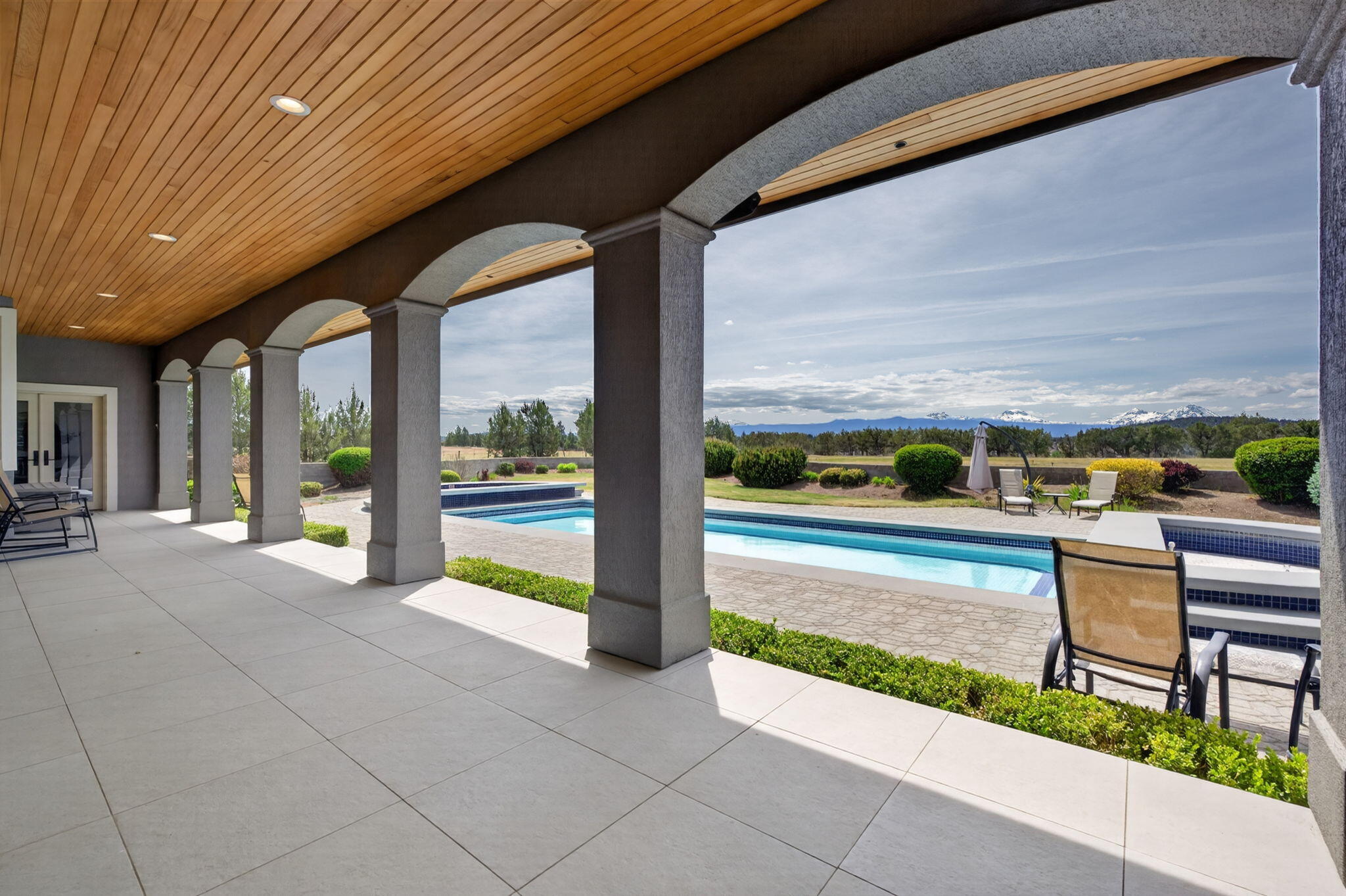 20180 Winston Loop Bend, OR 97703 - Photo 51 of 59 a view of swimming pool with outdoor seating