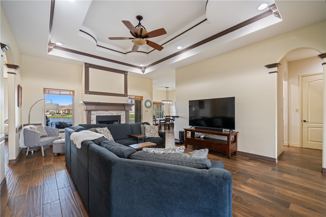 531 Pinehurst Portland, TX 78374 - Photo 2 of 36 a living room with furniture a fireplace and a flat screen tv