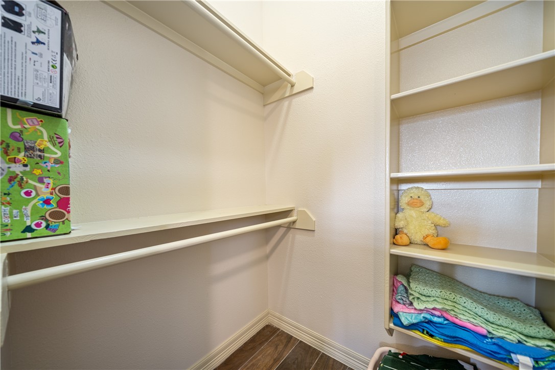 531 Pinehurst Portland, TX 78374 - Photo 23 of 36 a room with toys and wall painting on the wall