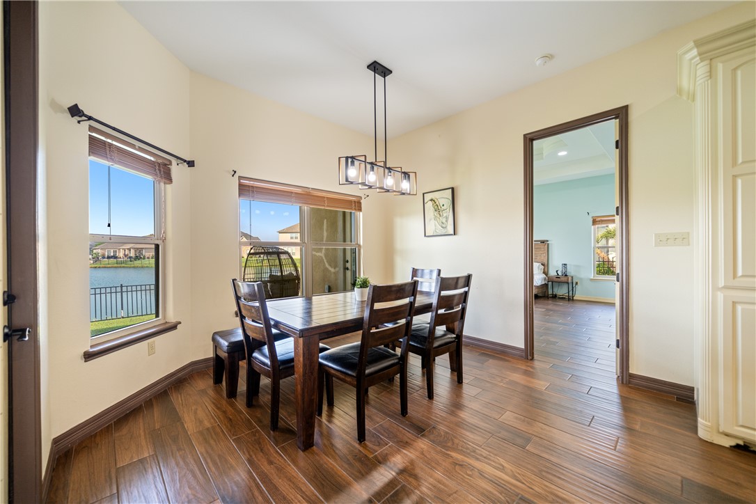 531 Pinehurst Portland, TX 78374 - Photo 3 of 36 a view of a dining room with furniture window and wooden floor