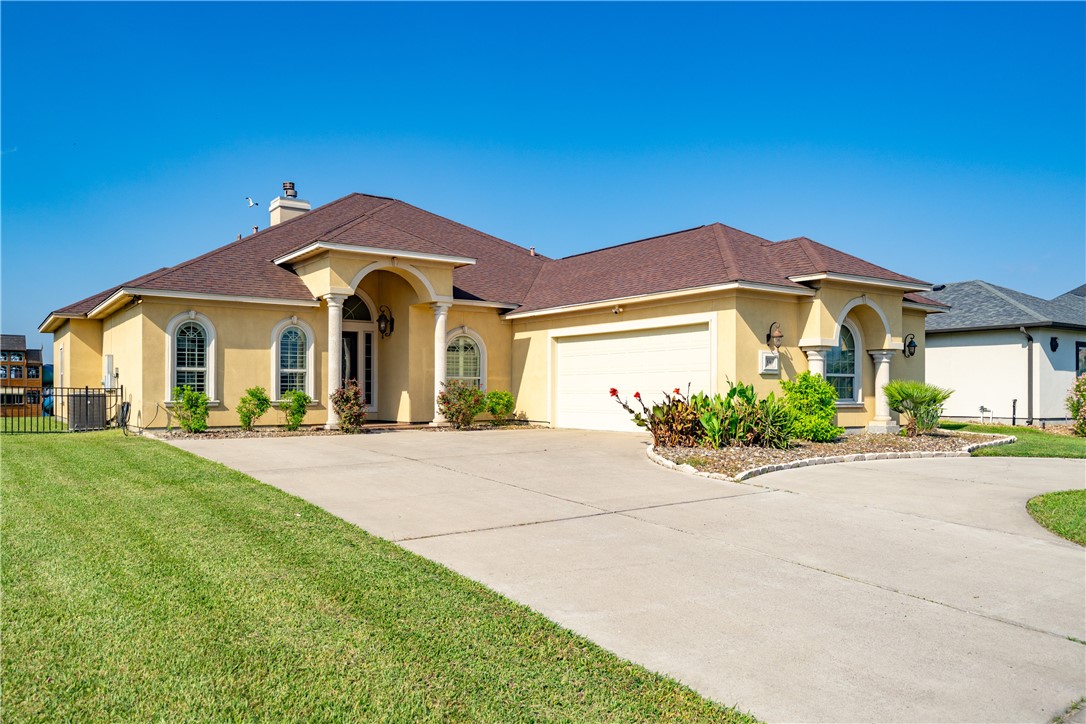 531 Pinehurst Portland, TX 78374 - Photo 35 of 36 a front view of a house with a garden