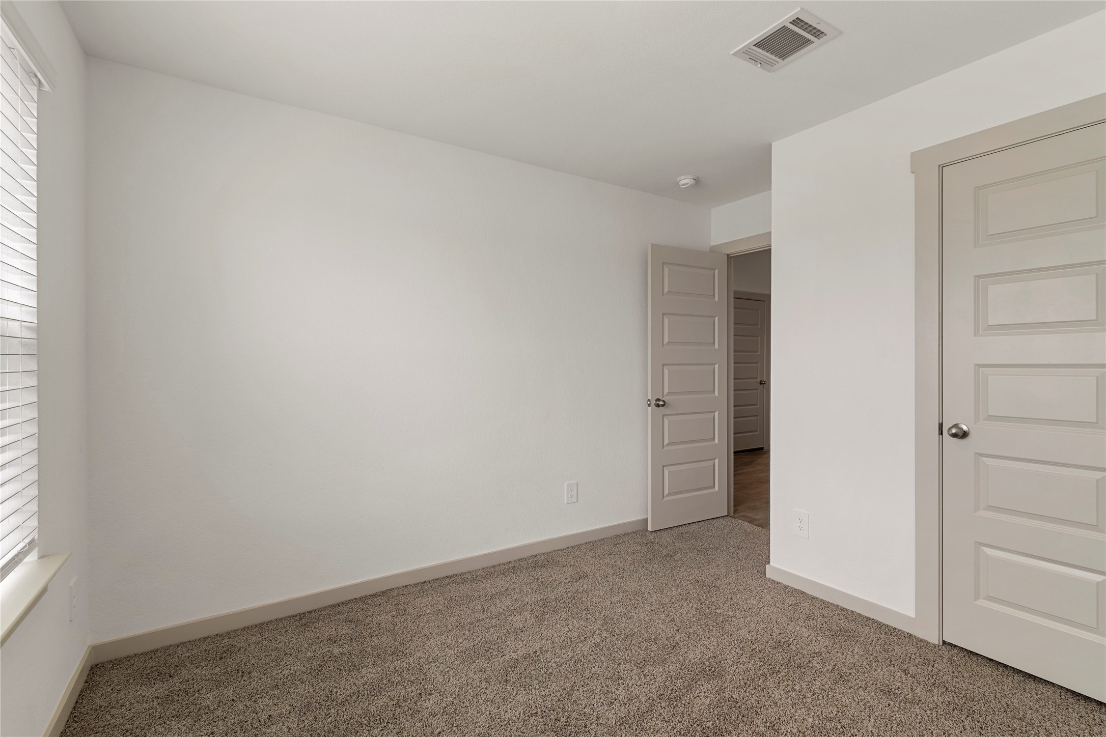 1203 Truckee River Drive Rosharon, TX 77583 - Photo 11 of 12 an empty room with windows