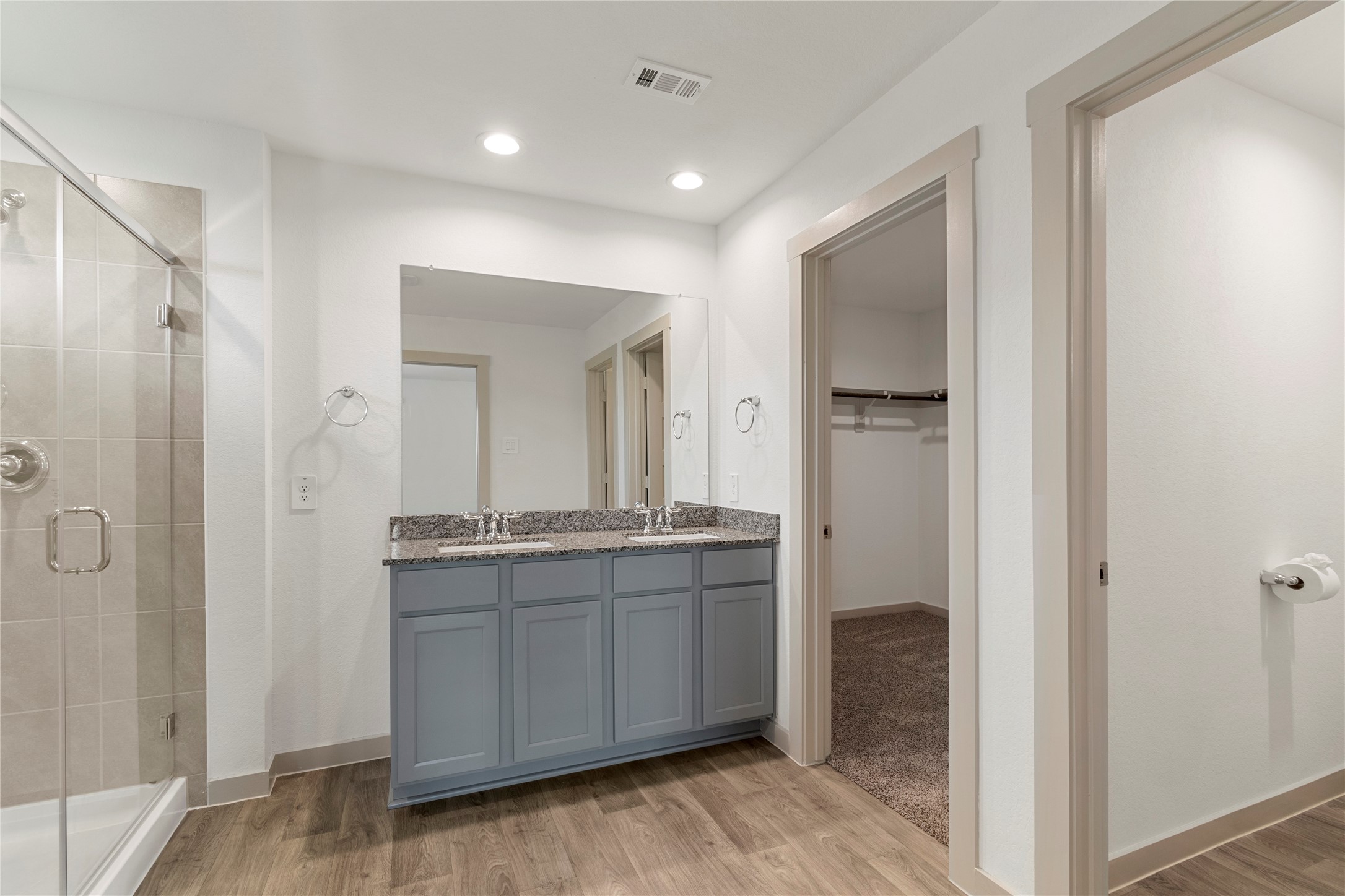 1203 Truckee River Drive Rosharon, TX 77583 - Photo 7 of 12 a bathroom with a granite countertop sink mirror and shower