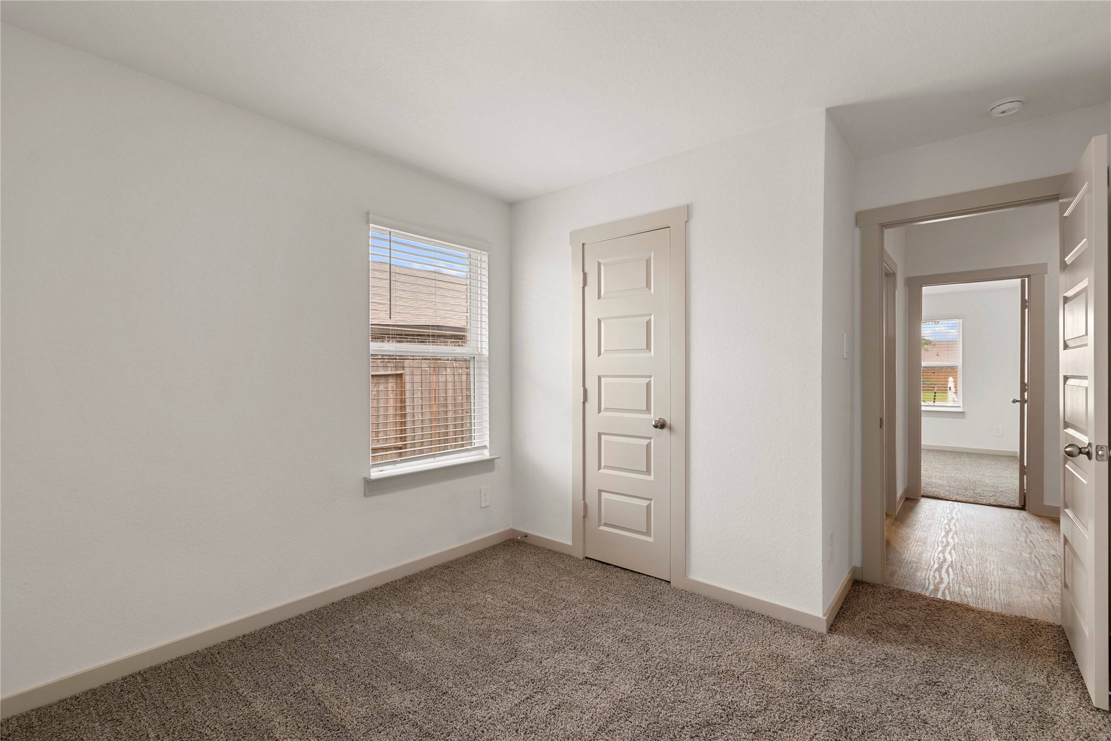1203 Truckee River Drive Rosharon, TX 77583 - Photo 9 of 12 an empty room with windows