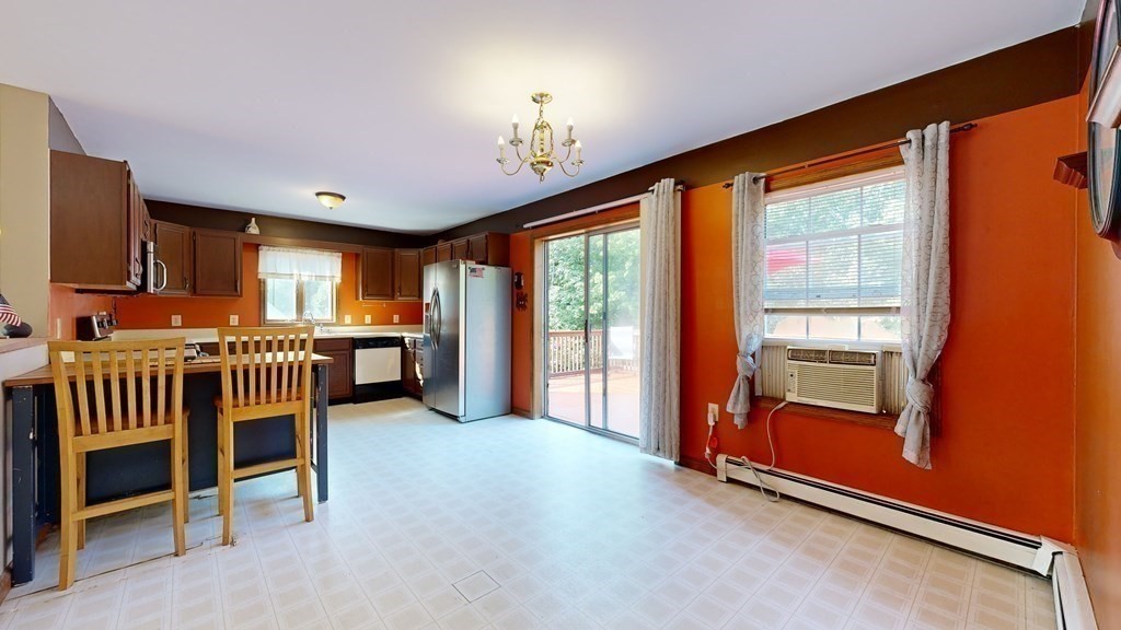 17 Mohave Road Worcester, MA 01606 - Photo 12 of 34 a view of an empty room with furniture and a window