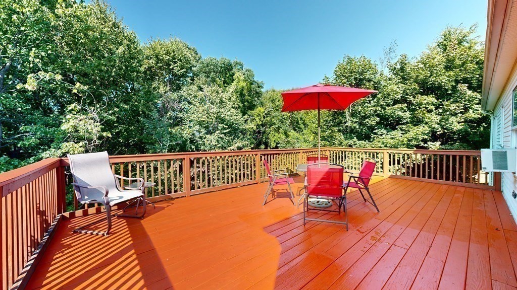 17 Mohave Road Worcester, MA 01606 - Photo 16 of 34 a balcony with wooden floor and furniture