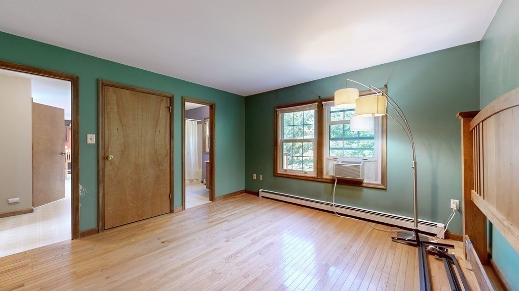 17 Mohave Road Worcester, MA 01606 - Photo 19 of 34 an empty room with wooden floor and windows