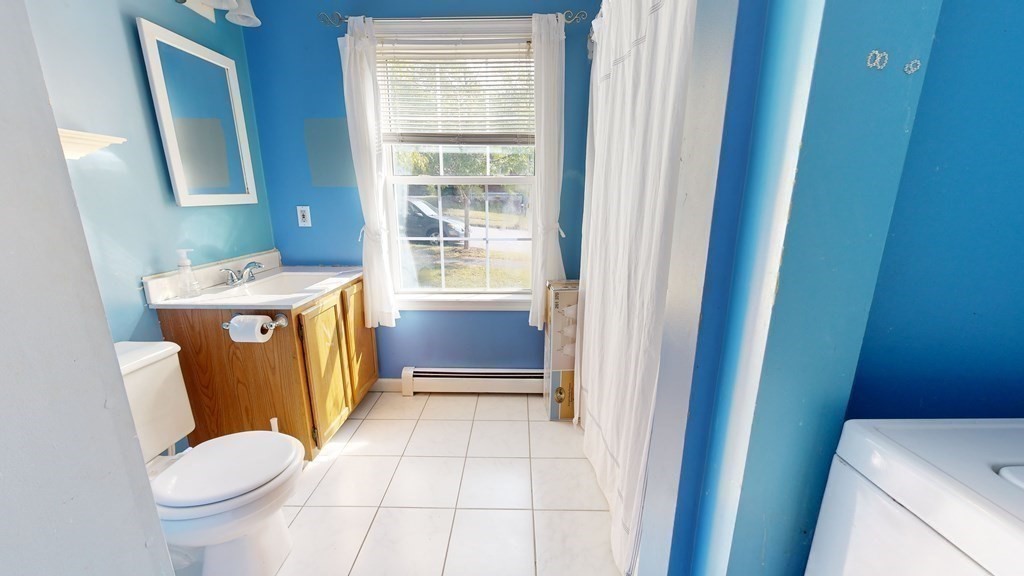 17 Mohave Road Worcester, MA 01606 - Photo 22 of 34 a bathroom with a sink toilet and window