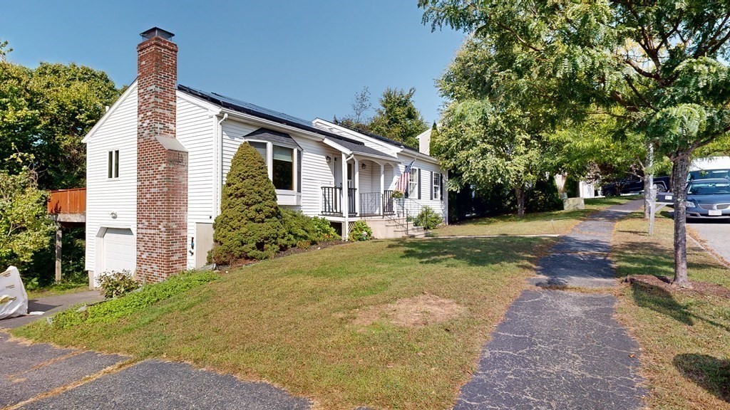 17 Mohave Road Worcester, MA 01606 - Photo 3 of 34 a front view of a house with garden