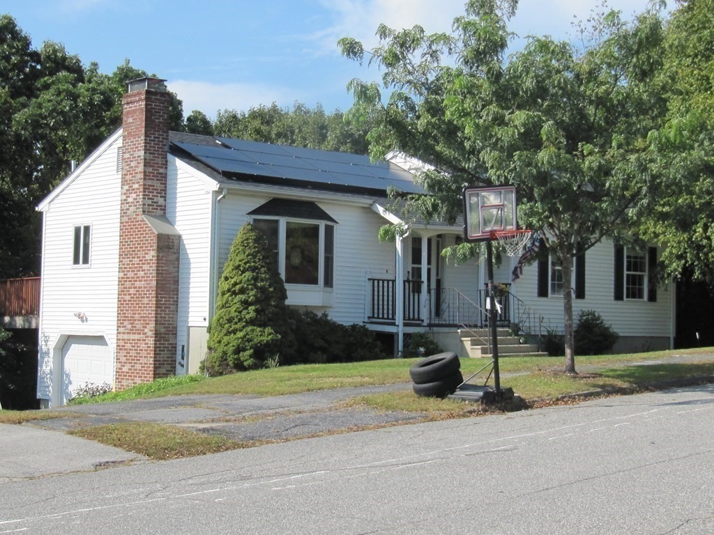 17 Mohave Road Worcester, MA 01606 - Photo 5 of 34 a front view of a house with a yard