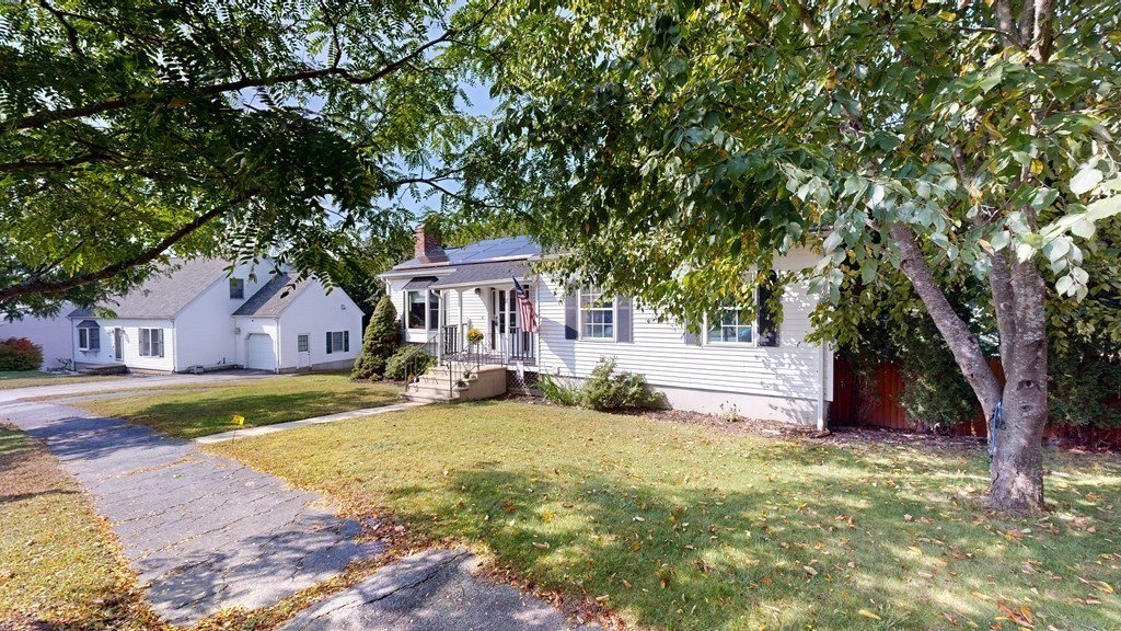 17 Mohave Road Worcester, MA 01606 - Photo 6 of 34 a front view of a house with a yard and trees