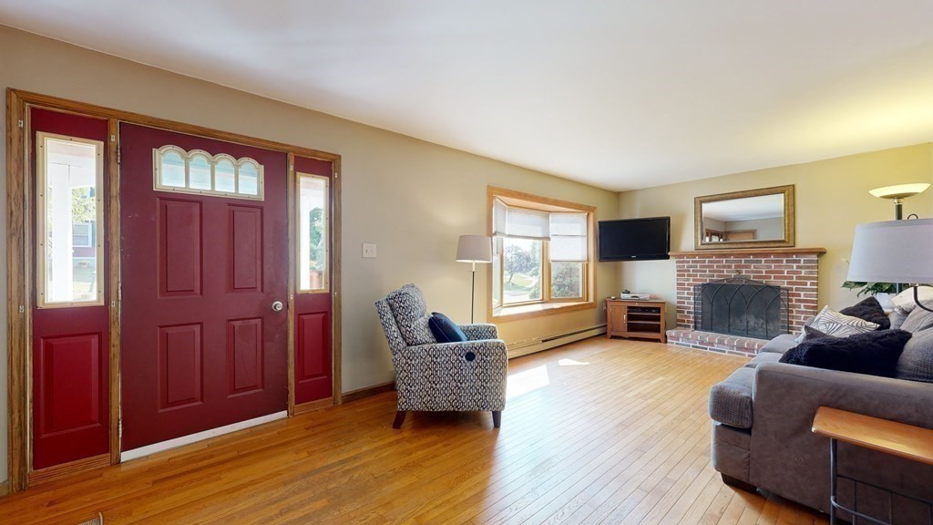 17 Mohave Road Worcester, MA 01606 - Photo 7 of 34 a living room with furniture and a fireplace