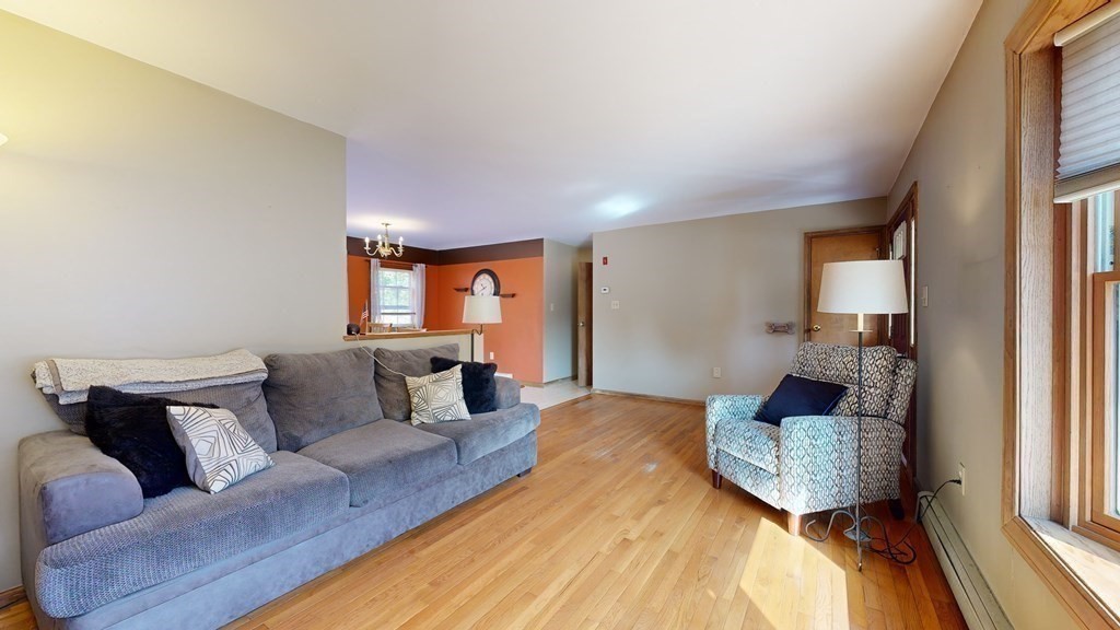 17 Mohave Road Worcester, MA 01606 - Photo 10 of 34 a bed room with a bed and a couch