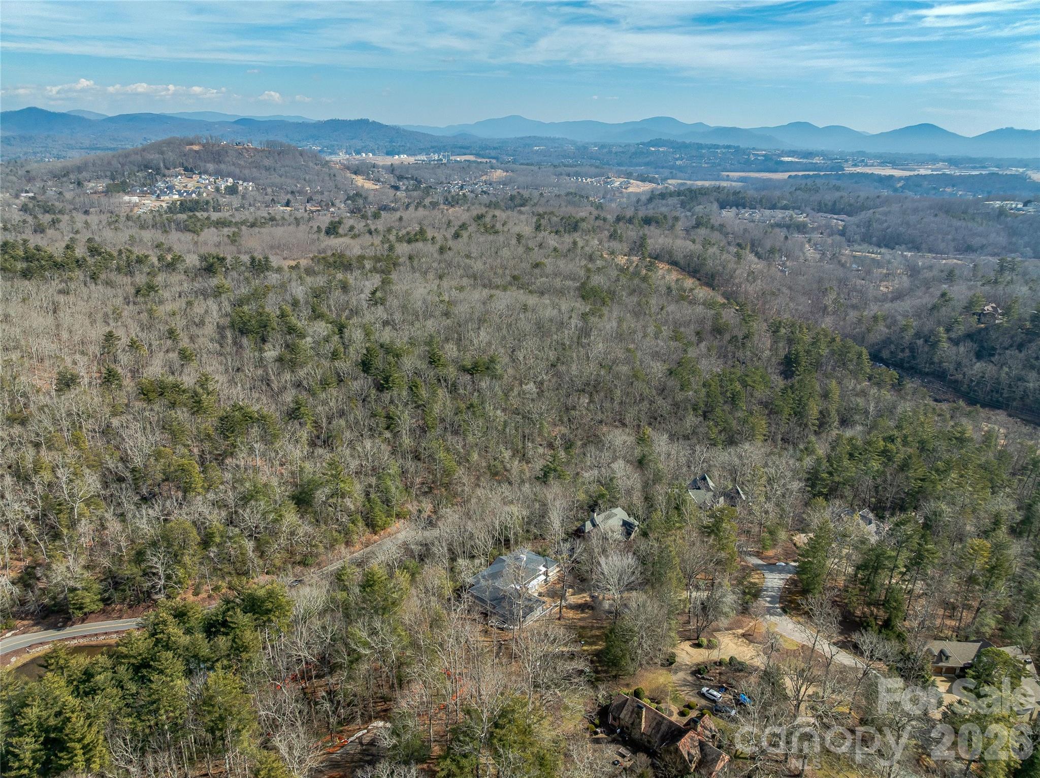 12 Falling Waters Trail Arden, NC 28704 - Photo 21 of 31 a view of a city with lush green forest