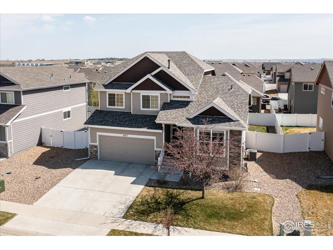 623 Gore Range Drive Severance, CO 80550 - Photo 1 of 36 a view of a house with a terrace