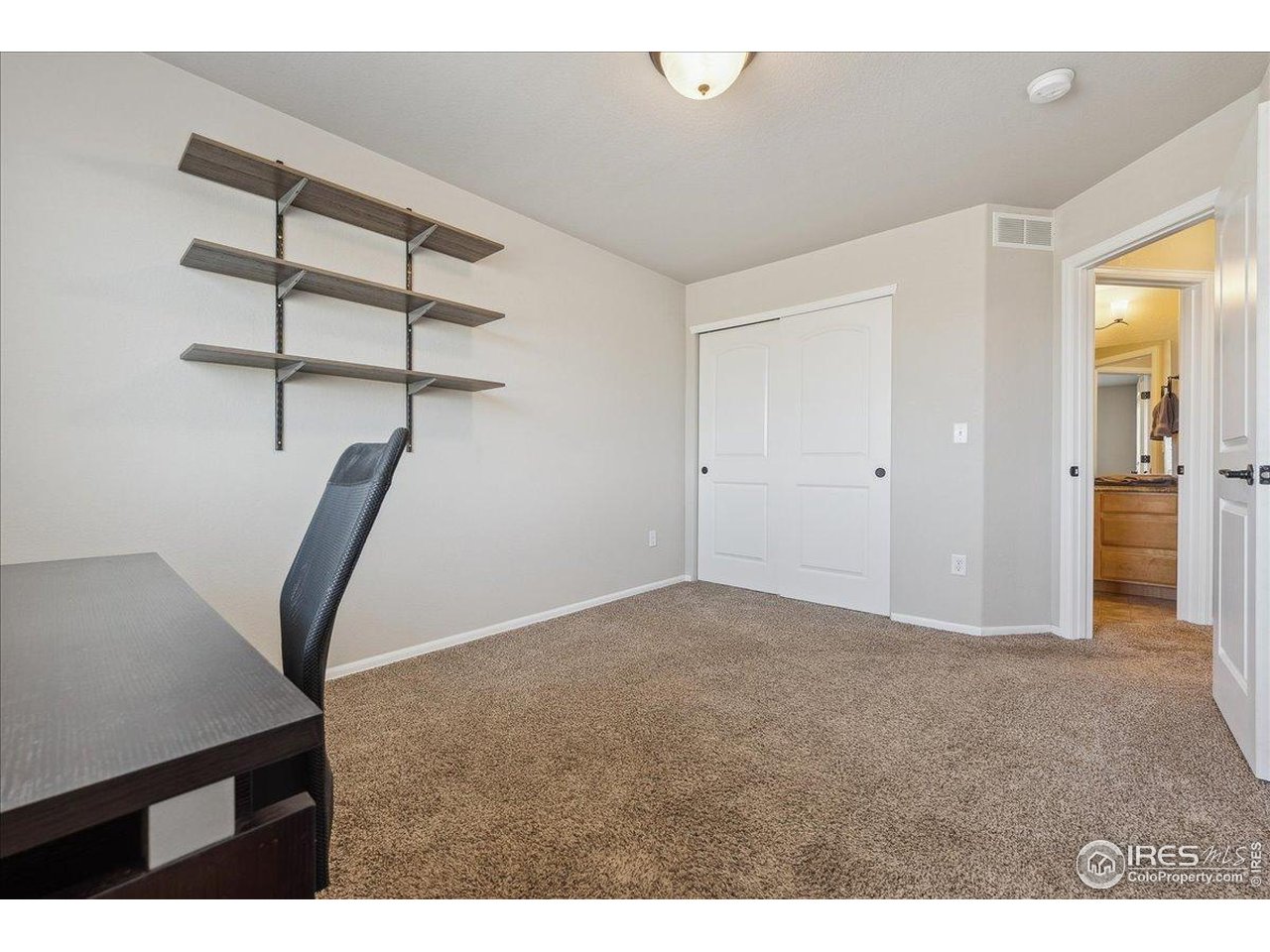 623 Gore Range Drive Severance, CO 80550 - Photo 24 of 36 a view of an empty room