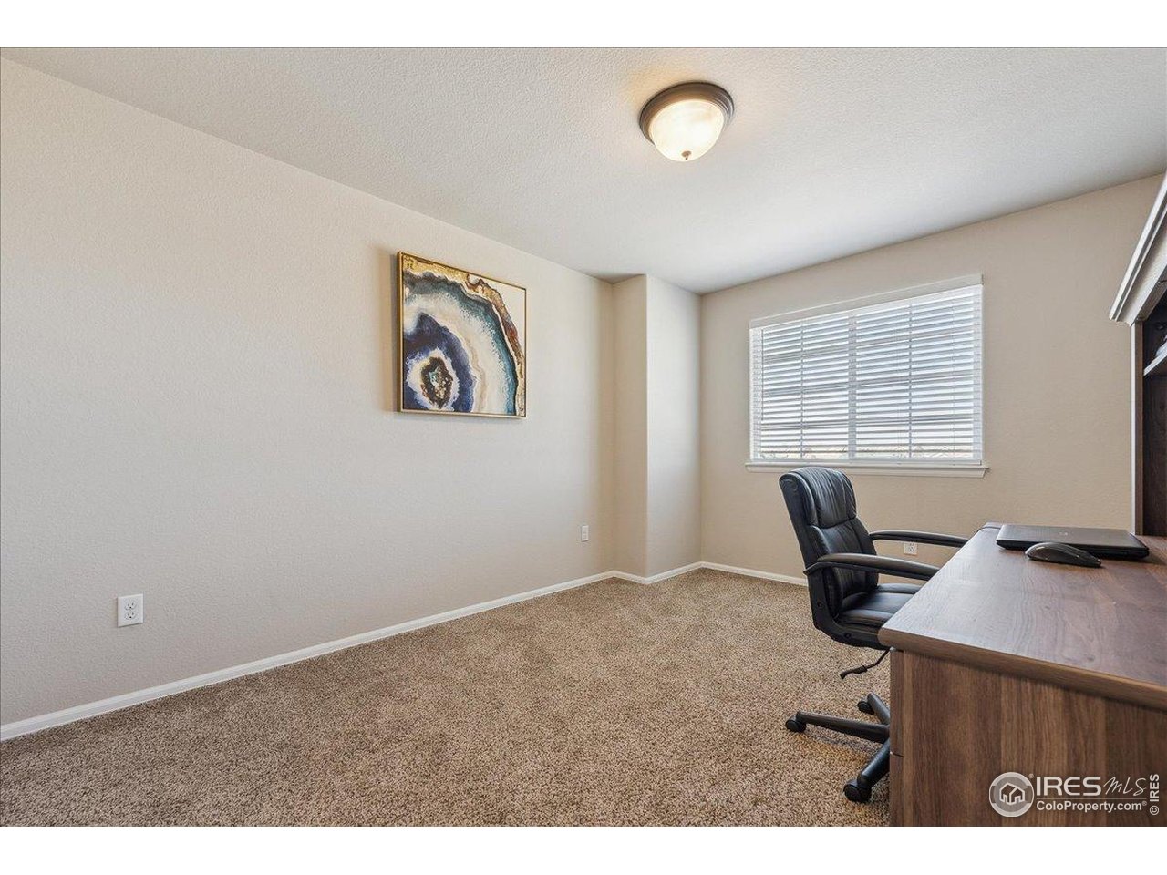 623 Gore Range Drive Severance, CO 80550 - Photo 26 of 36 a view of workspace with windows
