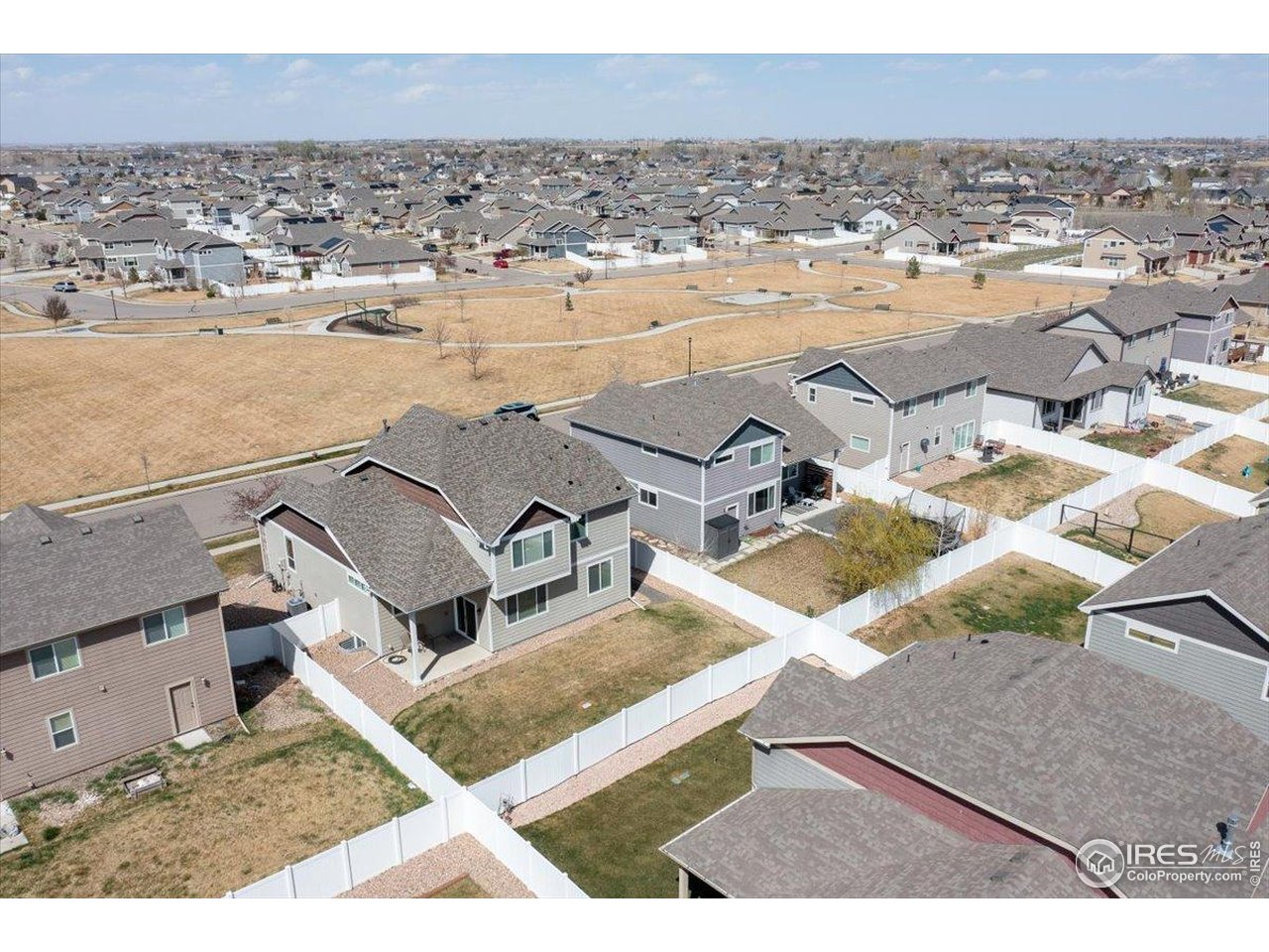 623 Gore Range Drive Severance, CO 80550 - Photo 30 of 36 an aerial view of residential houses with outdoor space