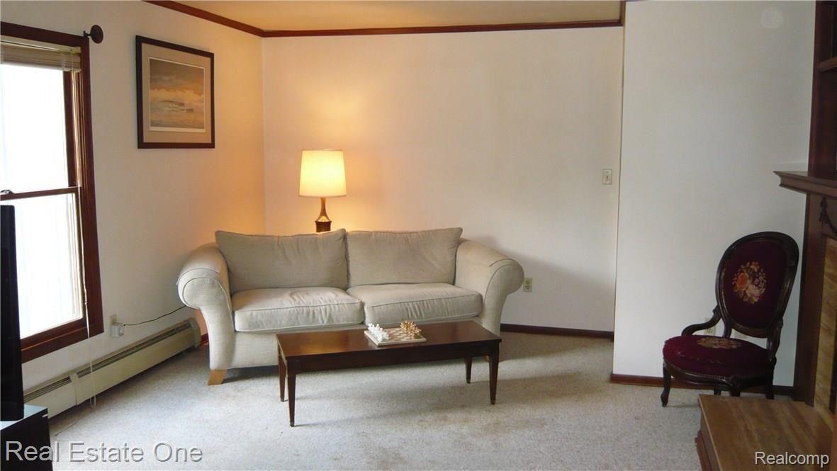 9639 Currie Road Northville, MI 48167 - Photo 16 of 24 BRIGHT & SUNNY LIVING AREA OFF DINING