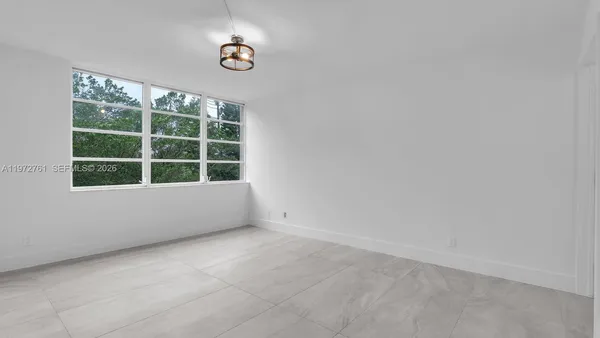 an empty room with a window