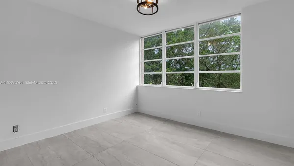 an empty room with a window