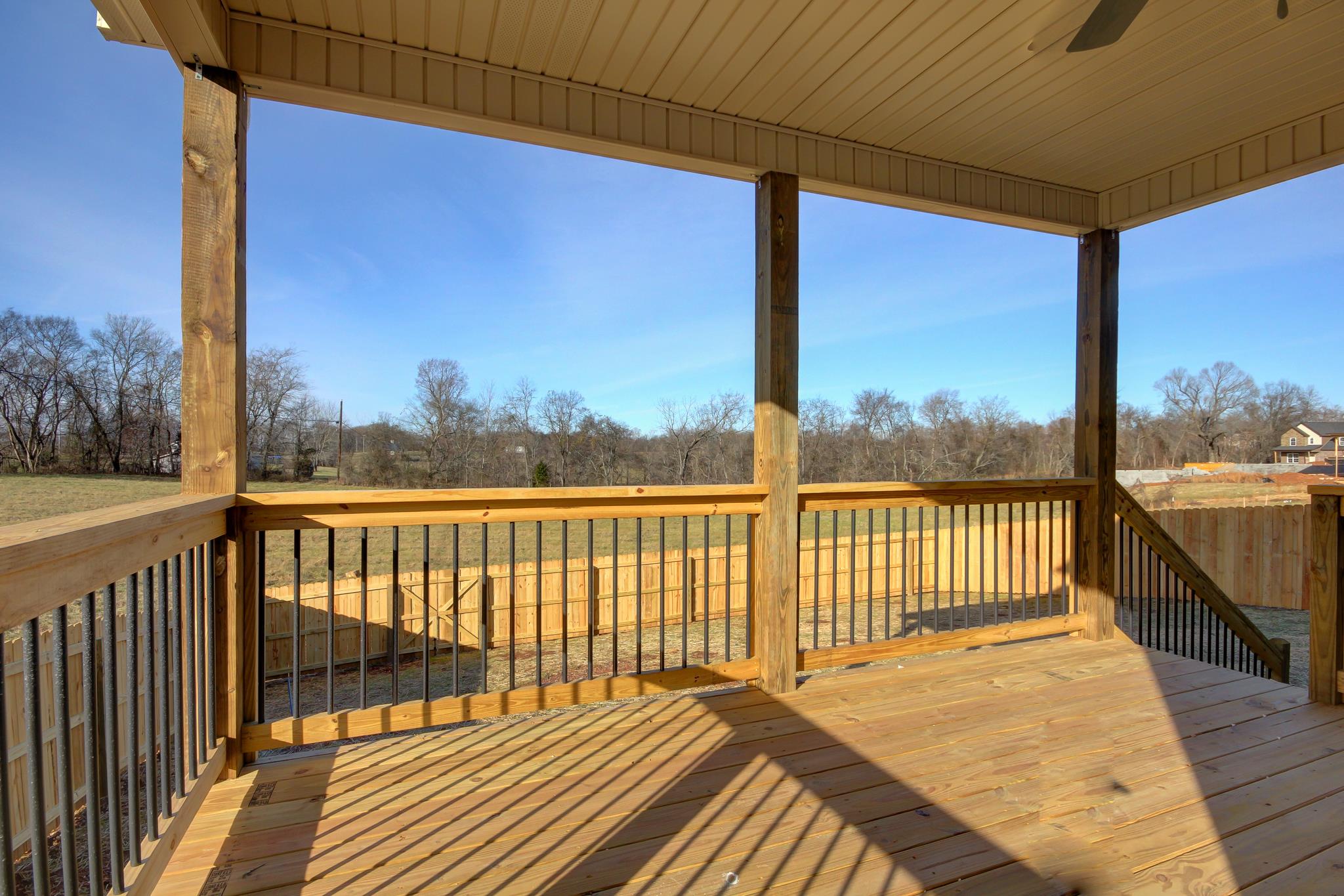 1019 Barnhill Road Clarksville, TN 37043 - Photo 24 of 26 a view of a balcony with wooden floor