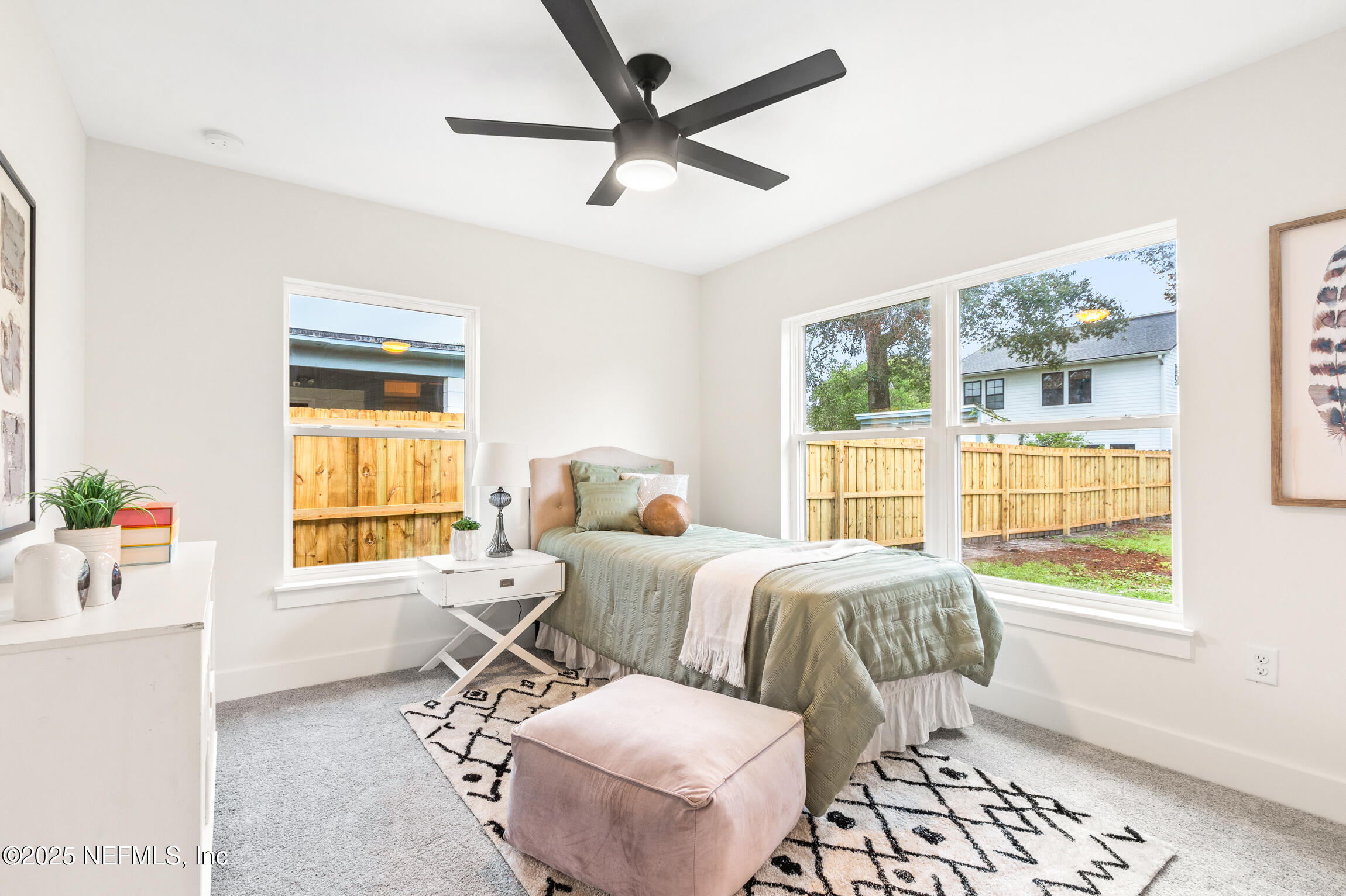 1746 Penman Road Jacksonville Beach, FL 32250 - Photo 31 of 40 a bedroom with furniture and a window