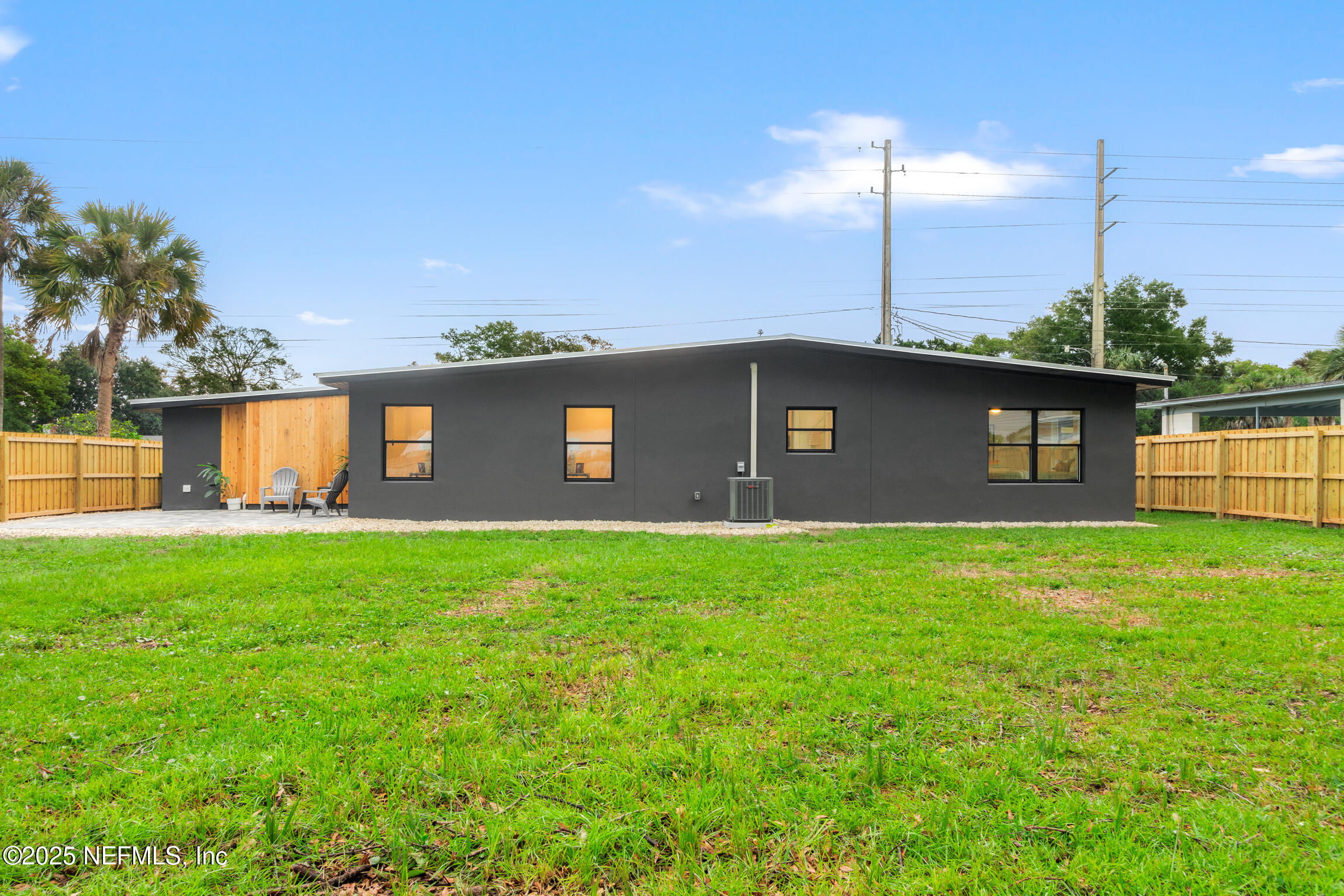 1746 Penman Road Jacksonville Beach, FL 32250 - Photo 38 of 40 a front view of a house with a yard