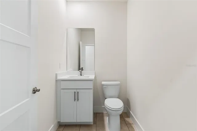 a view of an entryway with a floor to ceiling window next to a yard