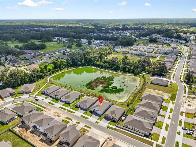 a view of a city with a lake
