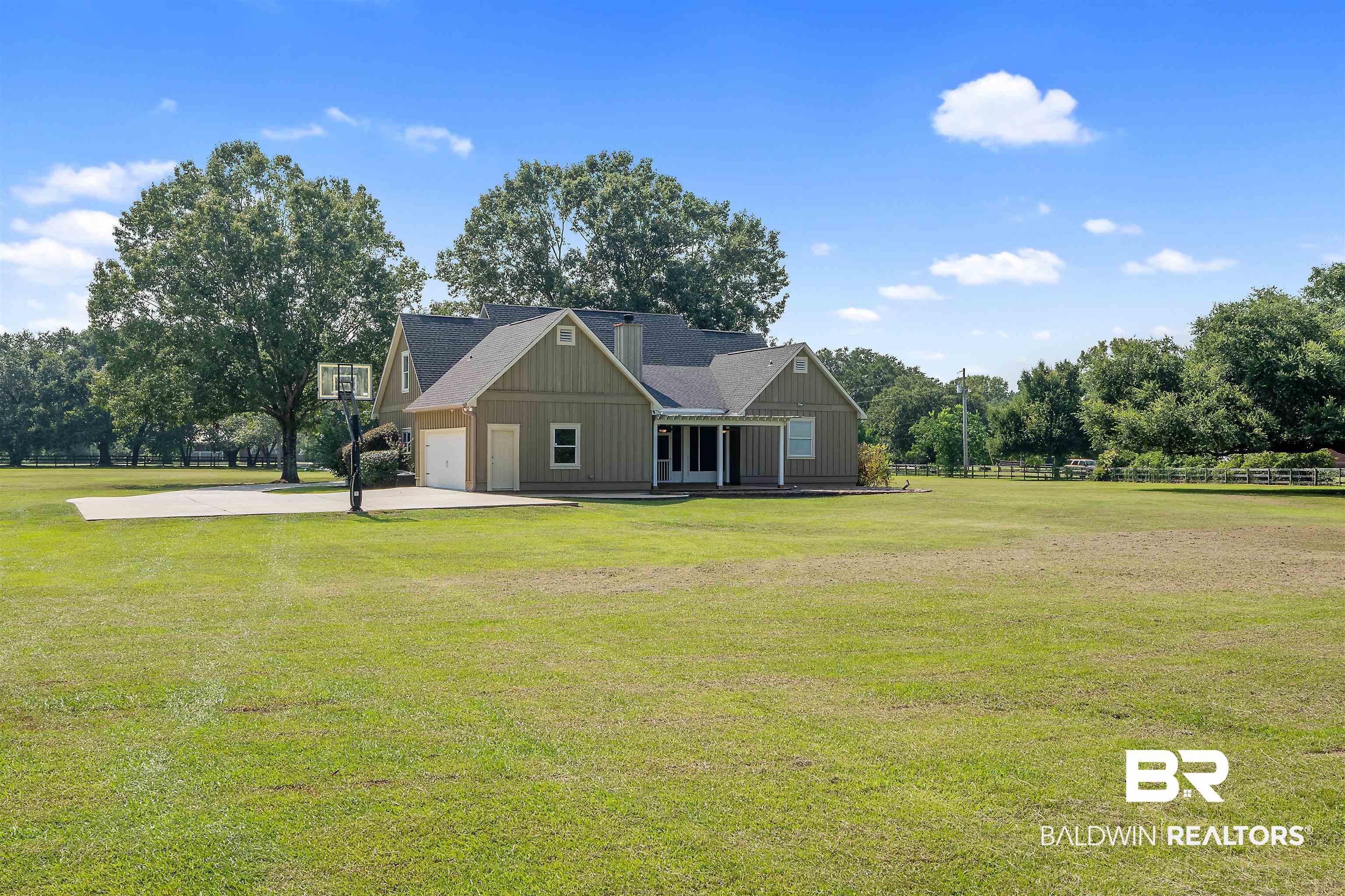 16330 Danne Road Fairhope, AL 36532 - Photo 34 of 43 View of front of home with a front lawn and a garage
