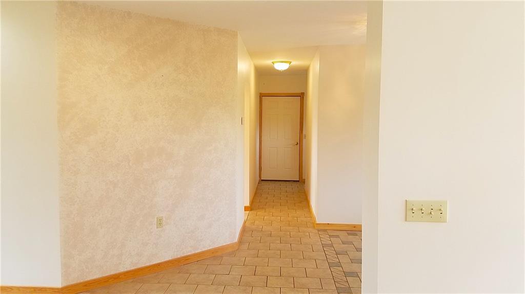 2269 Chapman Road Mapleton, ME 04757 - Photo 21 of 35 View to the hall way that leads to...