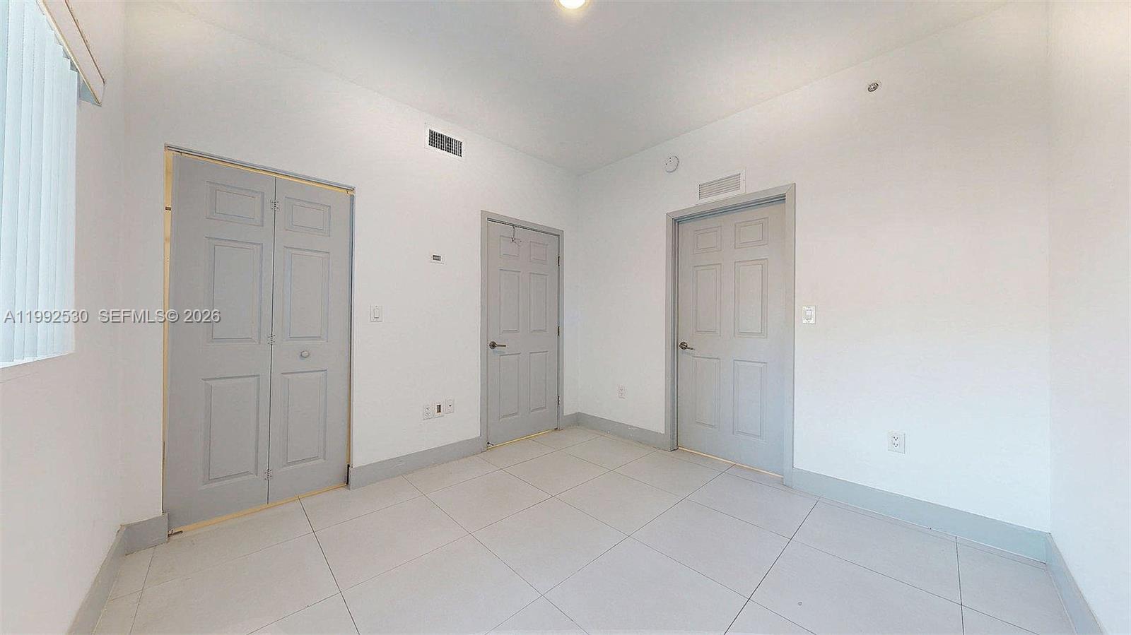 519 Southwest 5th Avenue, Unit 203 Miami, FL 33130 - Photo 21 of 26 a view of an empty room