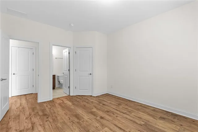 a bathroom with a sink toilet tub and shower
