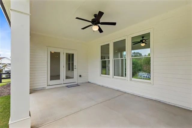 a front view of house with yard and swimming pool