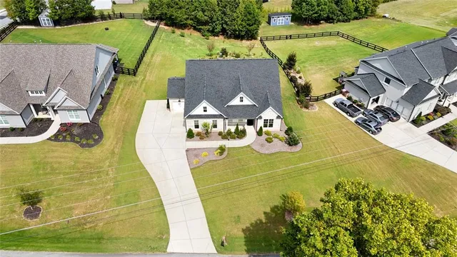 a aerial view of a house with a big yard