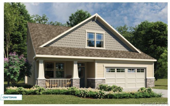 1267 Independence Street, Unit 81 Tega Cay, SC 29708 - Photo 1 of 10 a front view of a house with a yard