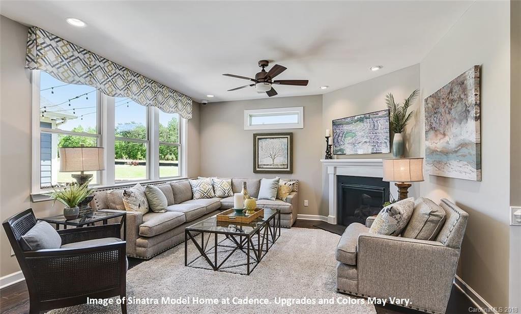 1267 Independence Street, Unit 81 Tega Cay, SC 29708 - Photo 5 of 10 a living room with furniture and a fireplace