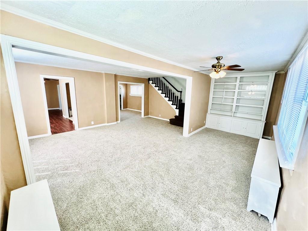 1032 Main Street Republic, PA 15475 - Photo 14 of 39 a view of an empty room with a fireplace