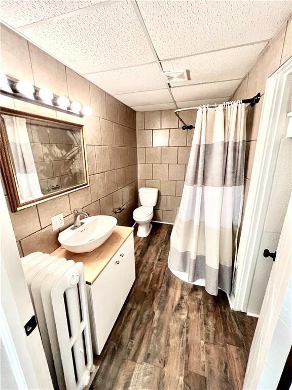 1032 Main Street Republic, PA 15475 - Photo 16 of 39 a bathroom with a sink and mirror with bathtub