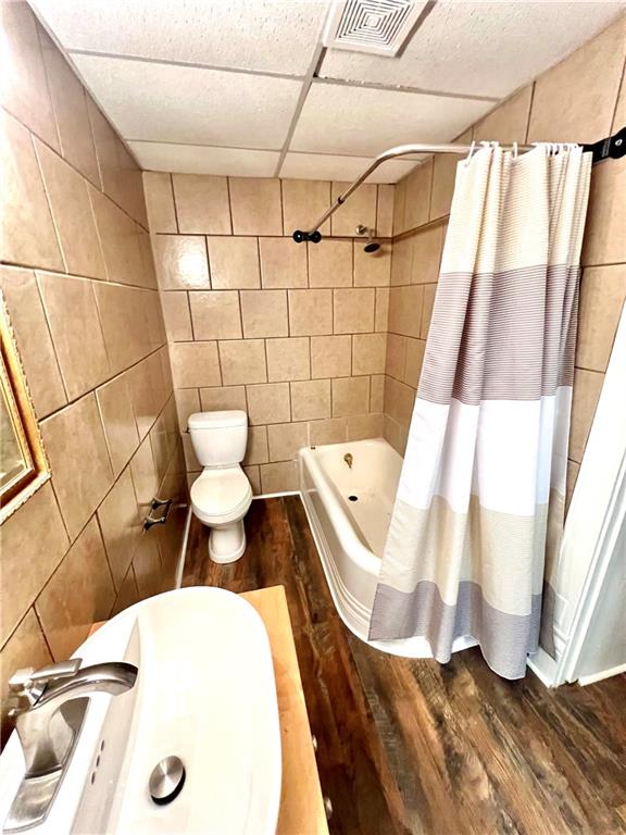 1032 Main Street Republic, PA 15475 - Photo 17 of 39 a bathroom with a sink and mirror with bathtub